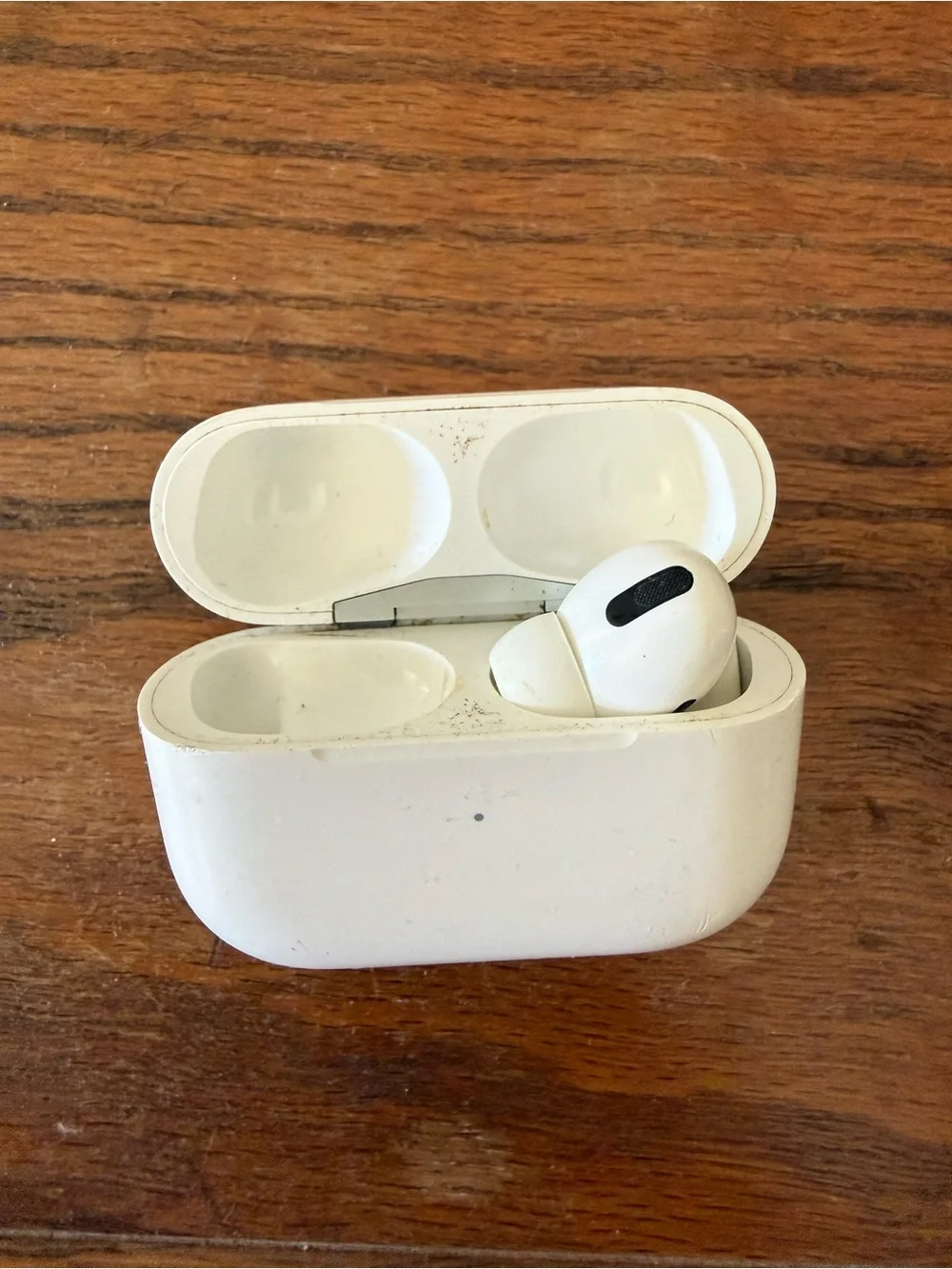 Apple White AirPods Pro with Charging Case (Single Earbud Shown)